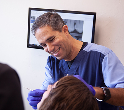 Doctor Mirsepasi treating a patient