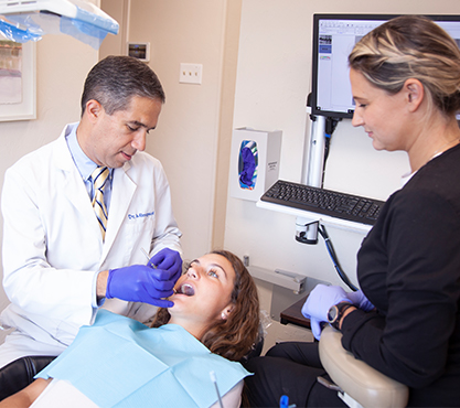 Doctor Mirsepasi and dental patient