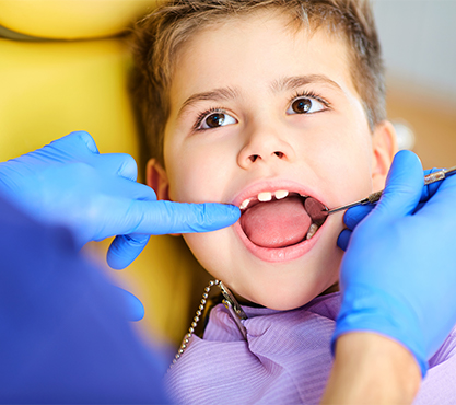 Child receiving dental exam