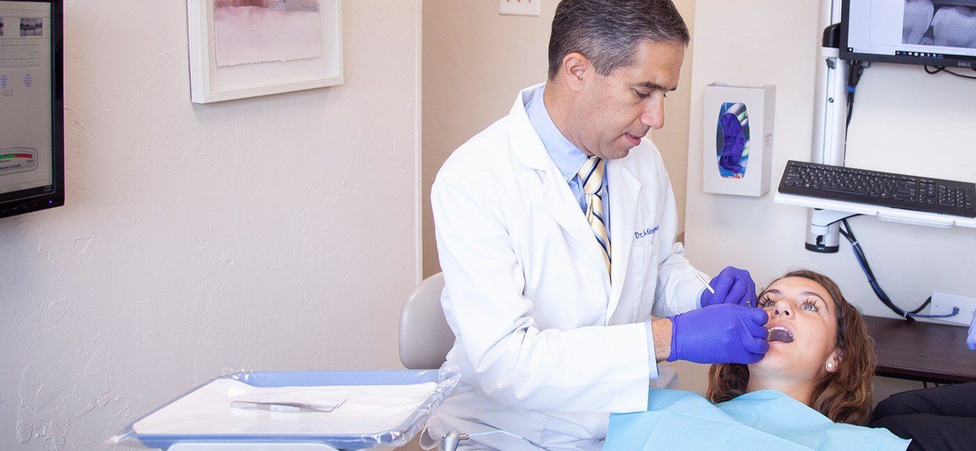 Dentist treating a patient