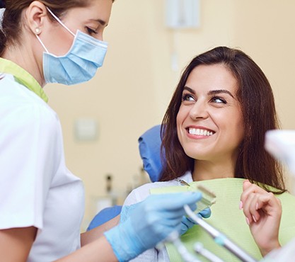 Woman talking to her dentist