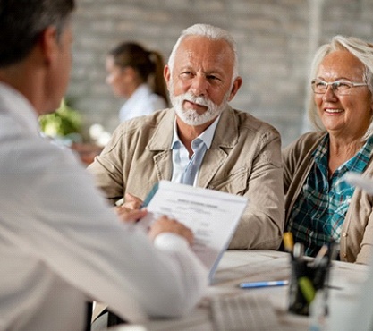 senior man and woman at a dental consultation