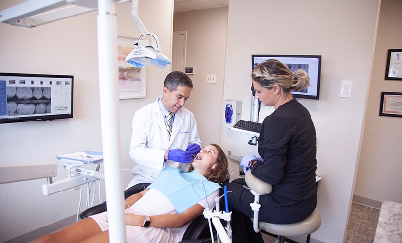 Dr. Mirsepasi treating dental patient