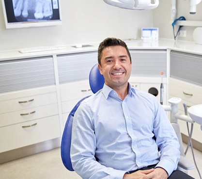 Man smiling in dental chair