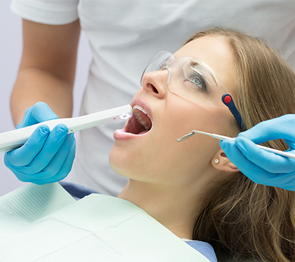 Dentist capturing intraoral images