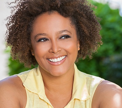 Woman smiling outdoors