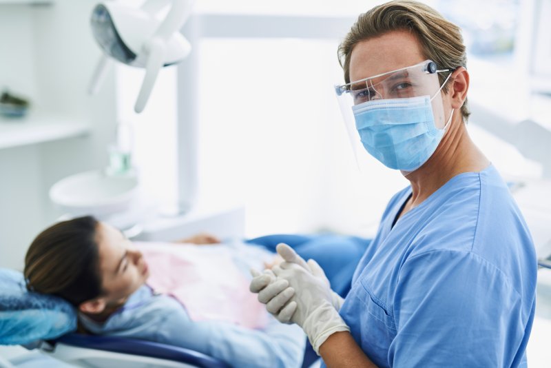 Dentist in Richardson wearing PPE 