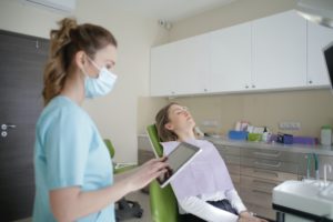 Woman in dental chair at dentist in Richardson.