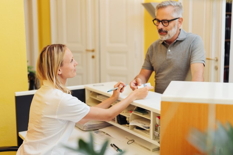 Patient making appointment for dental checkup